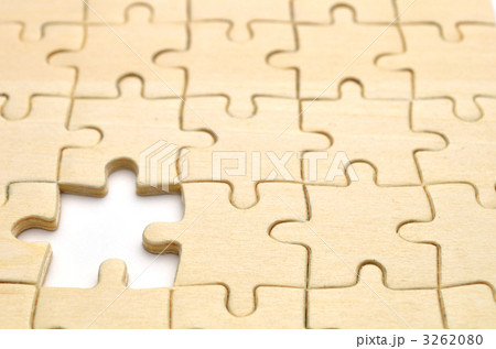 バラバラ シンプル ジクソーパズル 背景素材 パズルピースの写真素材