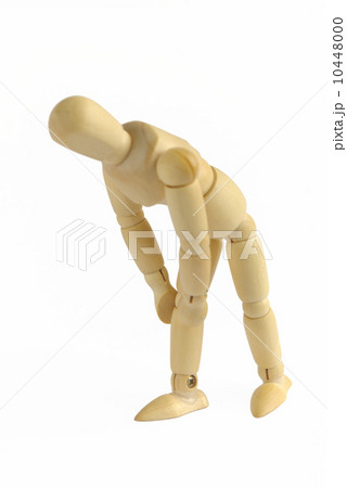 デッサン人形 屈む モデル人形 膝痛の写真素材
