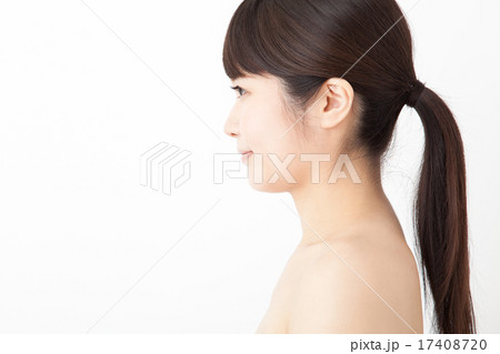 ポニーテール 女性 横顔 つやの写真素材