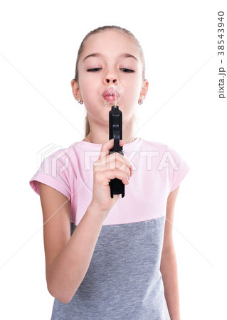 ガン 鉄砲 銃 吹くの写真素材