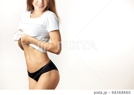 pretty girl demonstrating her underwear - Stock Photo [68368765