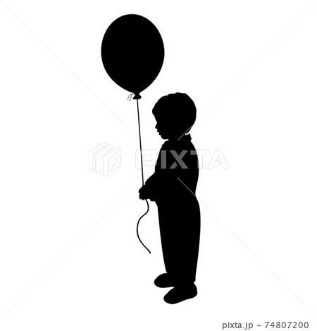 人物 子供 シルエット 風船の写真素材