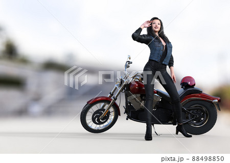 ライダー ポーズ バイク 女性の写真素材