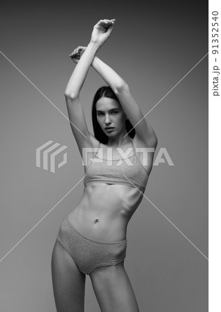 Sexy beautiful woman taking off her lace panties. - Stock Photo [41805449]  - PIXTA