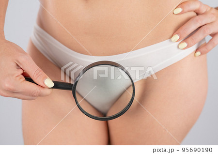 Unknown woman in white underwear experiences severe pain and