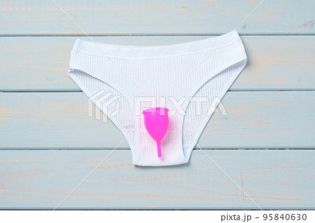 Cute, funny happy pink panties and tampon menstrual. Vector hand