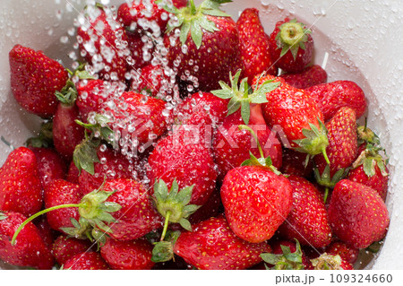 Red Ripe Fresh Strawberries In Kids Hands On Strawberry Background. Stock  Photo, Picture and Royalty Free Image. Image 40973397.